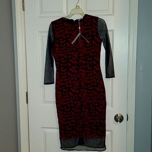 Houndstooth-jersey dress with tulle underskirt and sleeves